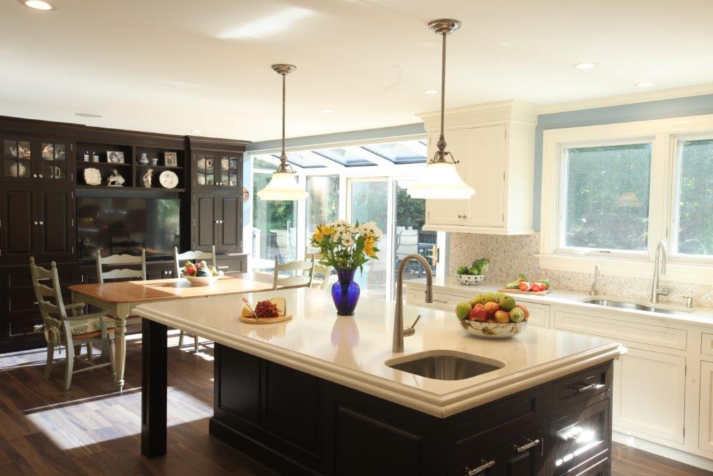 A transitional kitchen with oyster colored cabinets and a large island